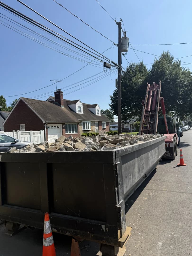 Concrete dumpster for heavy debris disposal